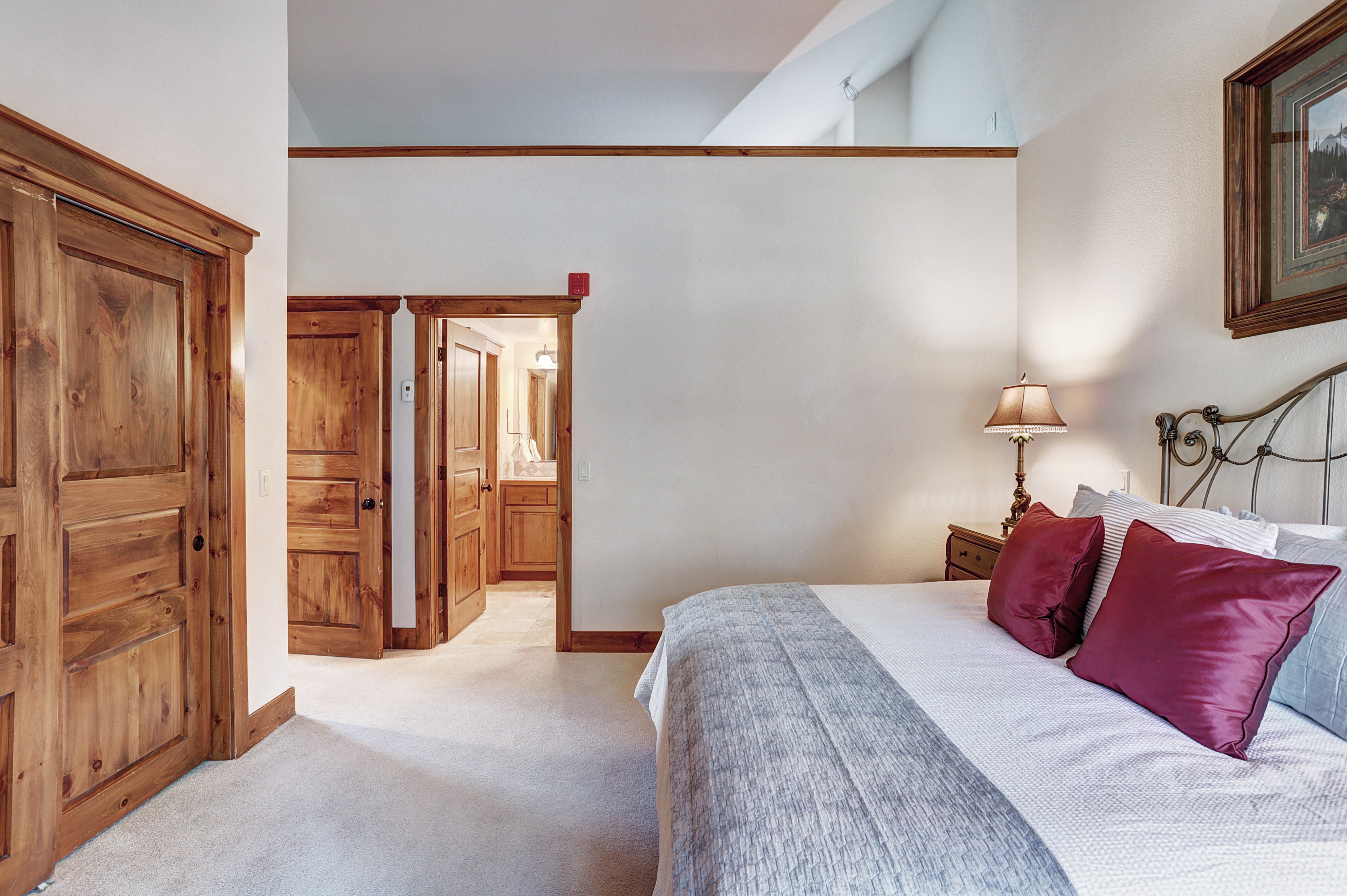 This master bedroom offers ample closet space and a private ensuite bathroom - Amber Sky Breckenridge Vacation Rental