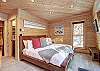 Upper level master suite with King-size bed, private deck, and private bath - Arrow Darrow Breckenridge Vacation Rental 