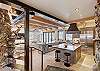 View of the kitchen from the main entry landing - Arrow Darrow Breckenridge Vacation Rental 