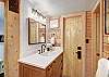 Main level master private bath with large walk-in shower and 2 sinks - Arrow Darrow Breckenridge Vacation Rental 