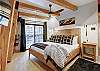 Main level master with King-size bed, private deck, flat screen TV, and private bath - Arrow Darrow Breckenridge Vacation Rental 