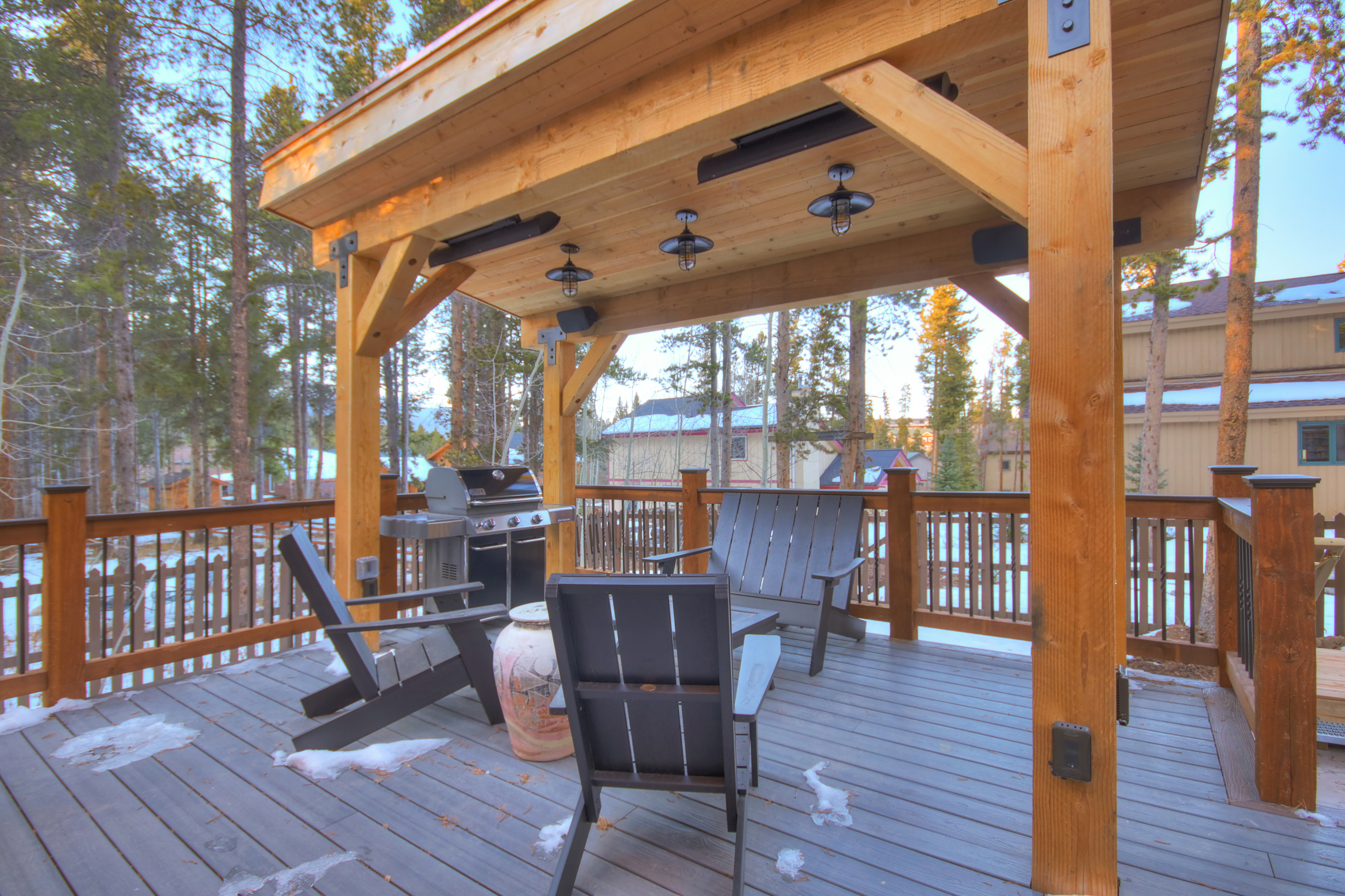 Deck with outdoor seating and gas grill