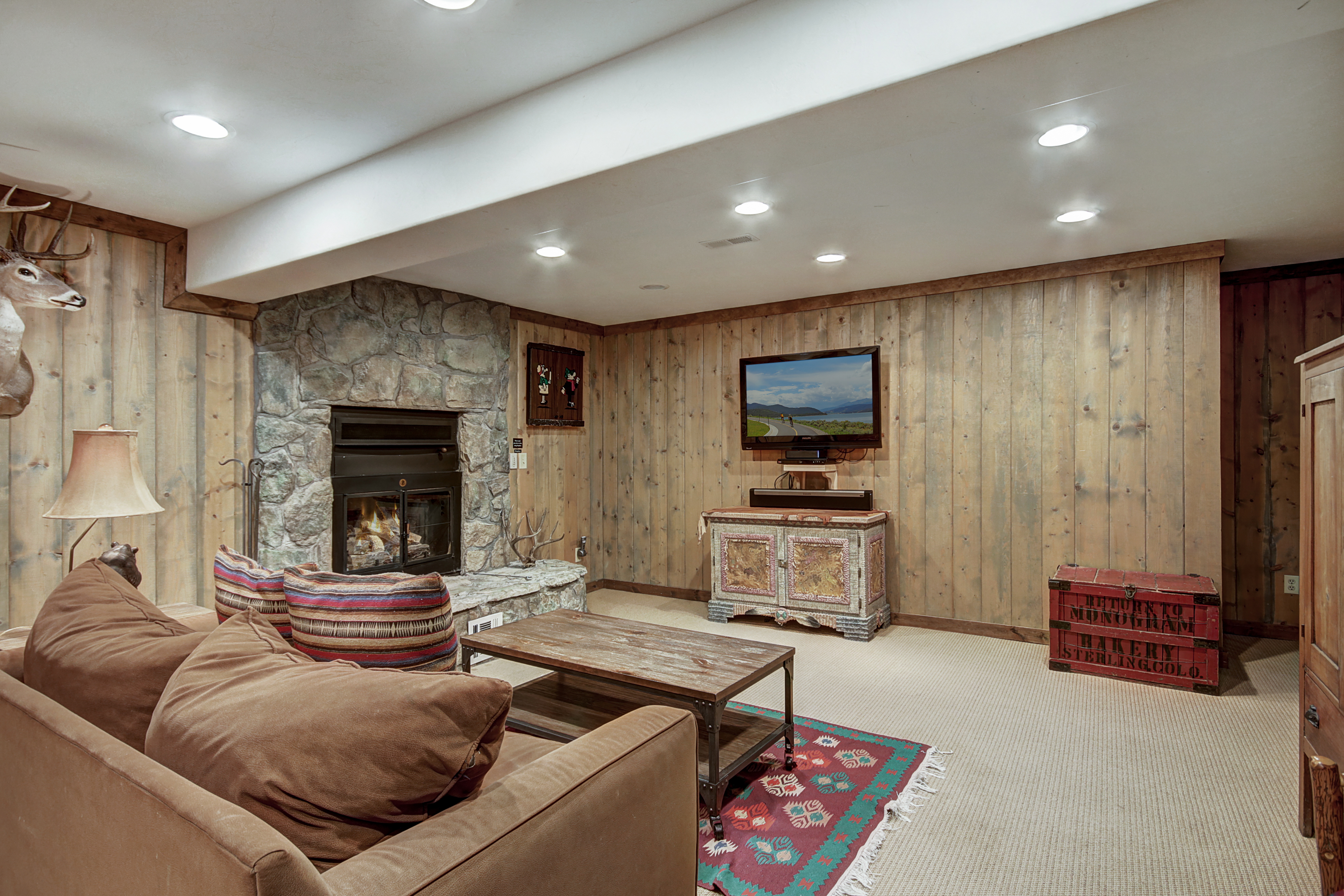 View of downstairs living area and television - Bear Lodge Breckenridge Vacation Rental
