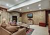 View of downstairs living area and television - Bear Lodge Breckenridge Vacation Rental 