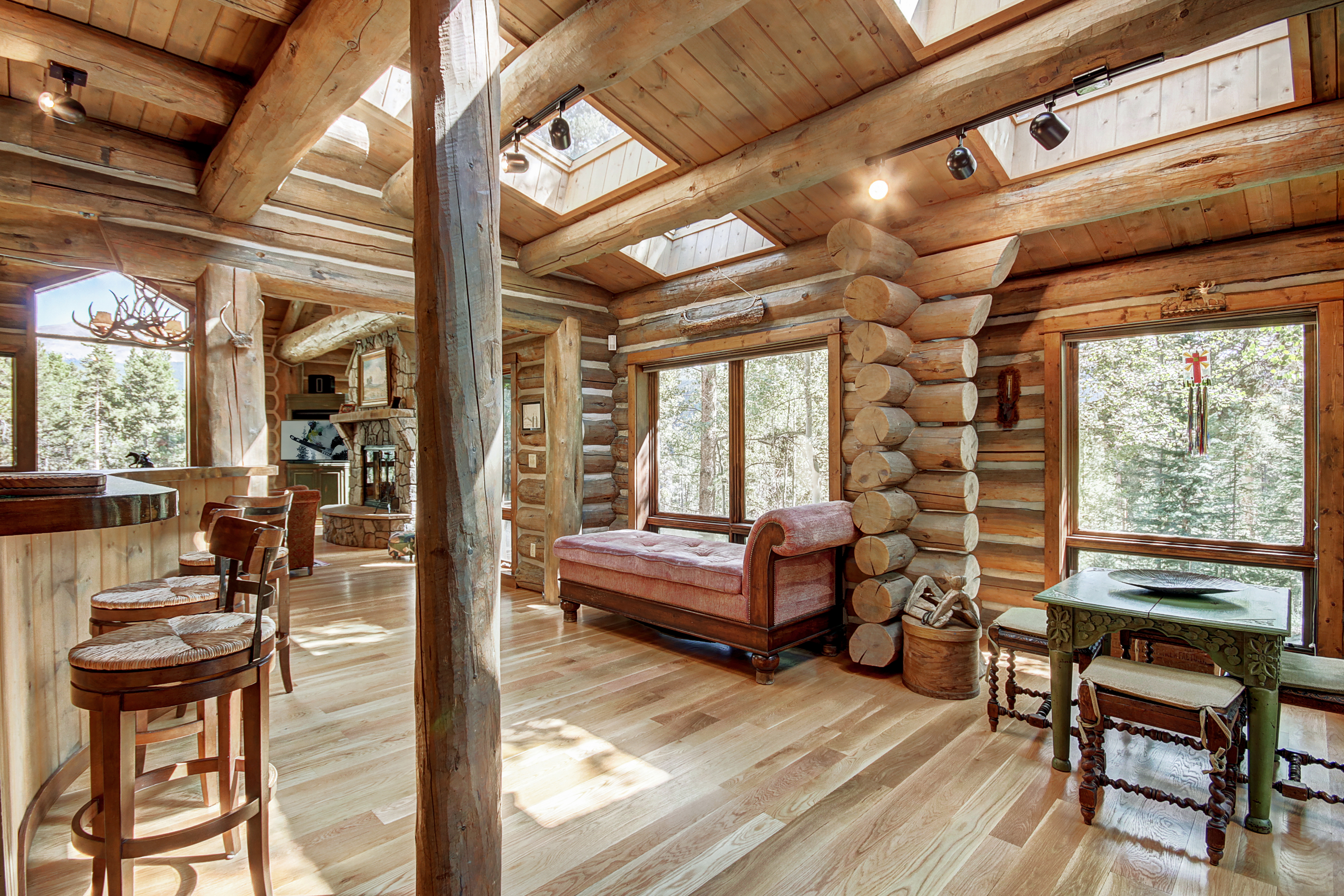Seating area off of the kitchen offers a daybed and card table - Bear Lodge Breckenridge Vacation Rental