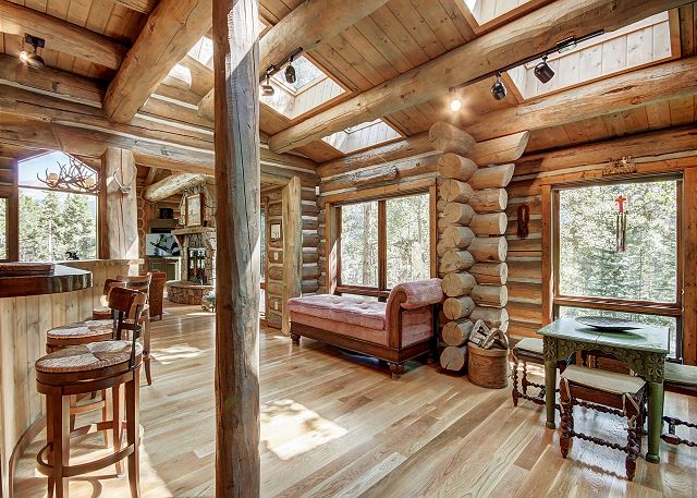 Seating area off of the kitchen offers a daybed and card table - Bear Lodge Breckenridge Vacation Rental