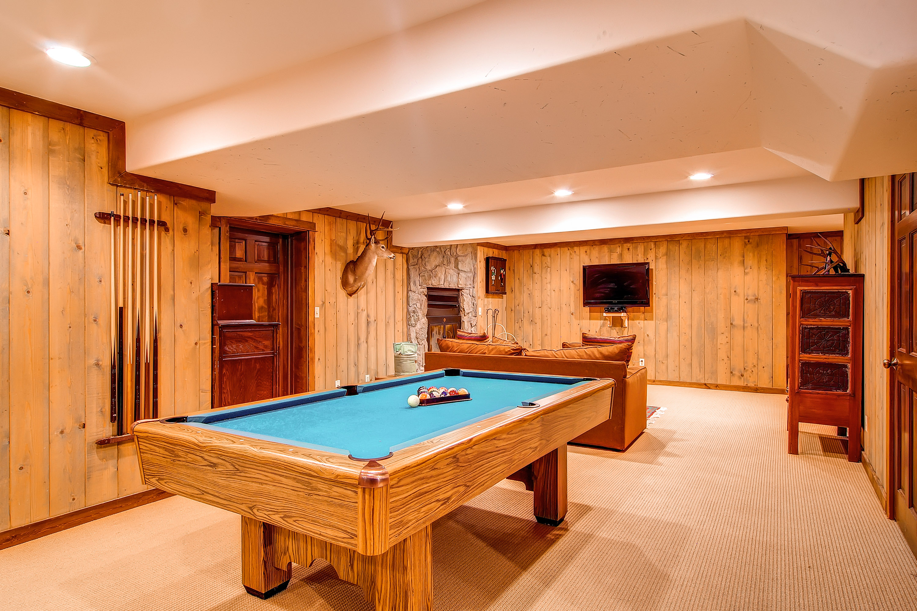 Game room and additional living room on the lower level - Bear Lodge Breckenridge Vacation Rental