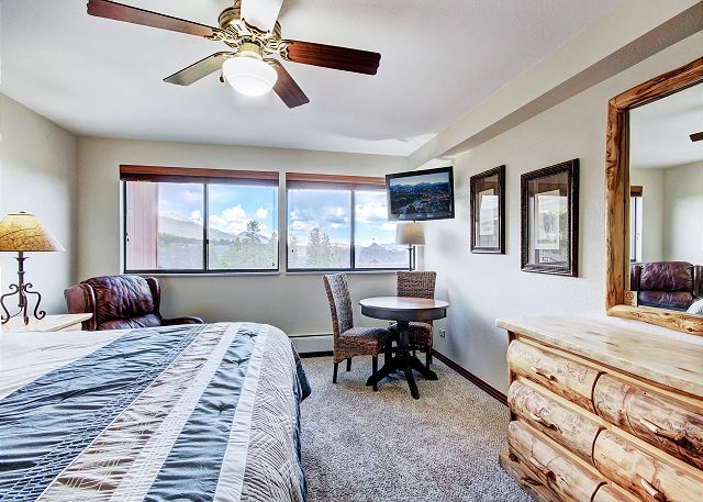 Beautiful views, card table/extra seating, storage space, television; this bedroom has it all! - Beaver Run Black Diamond Penthouse Breckenridge Vacation Rental