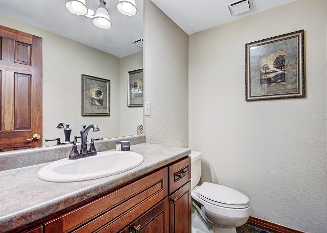 Half bathroom located off the living room. - Beaver Run Black Diamond Penthouse Breckenridge Vacation Rental