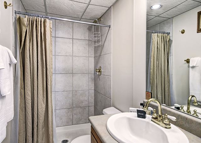 Main level bathroom for king bedroom. - Beaver Run Black Diamond Penthouse Breckenridge Vacation Rental