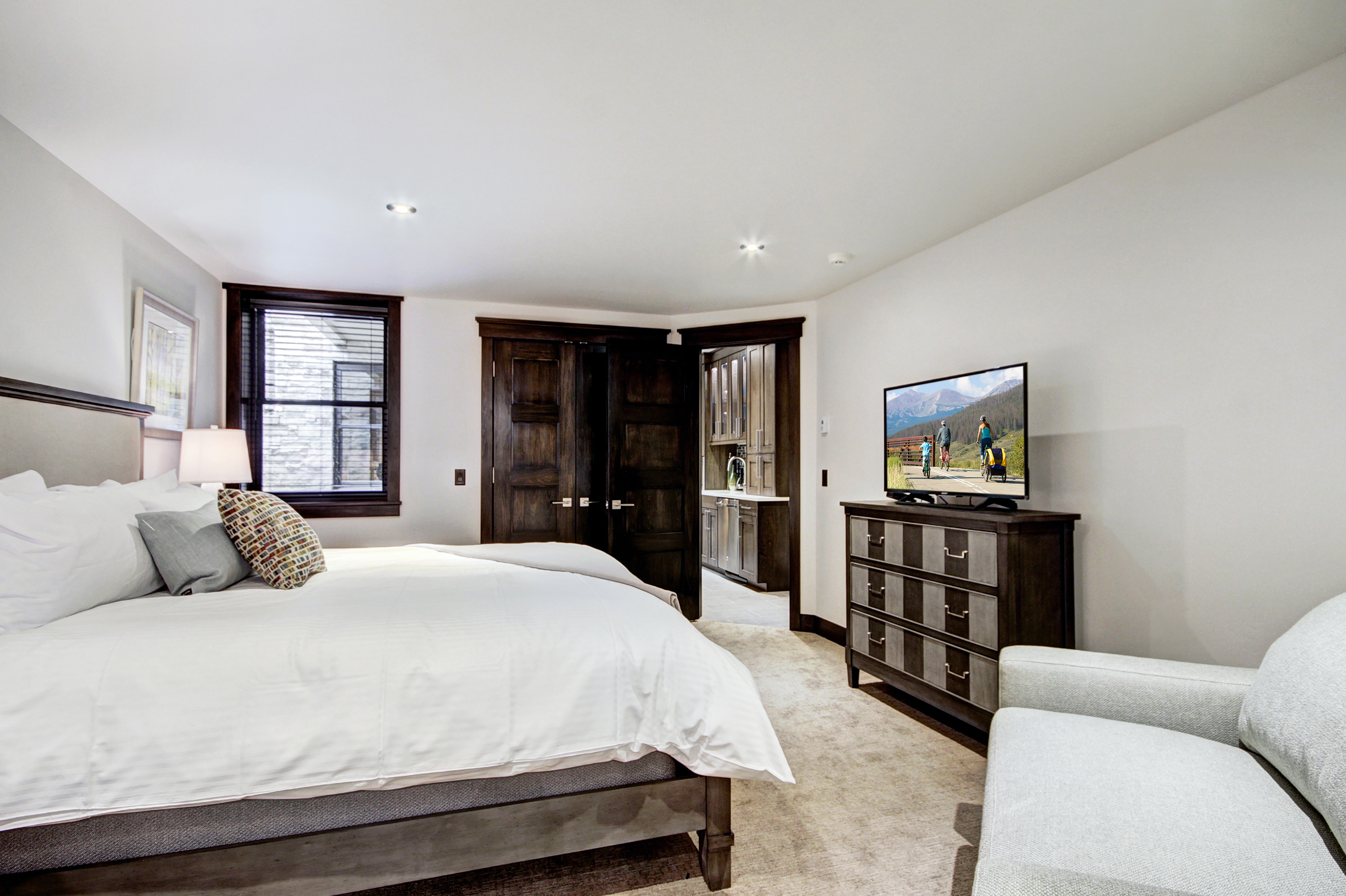 The lower level master bedroom has a king bed as well as a twin XL sleeper sofa. -  The Bogart House Breckenridge Vacation Rental