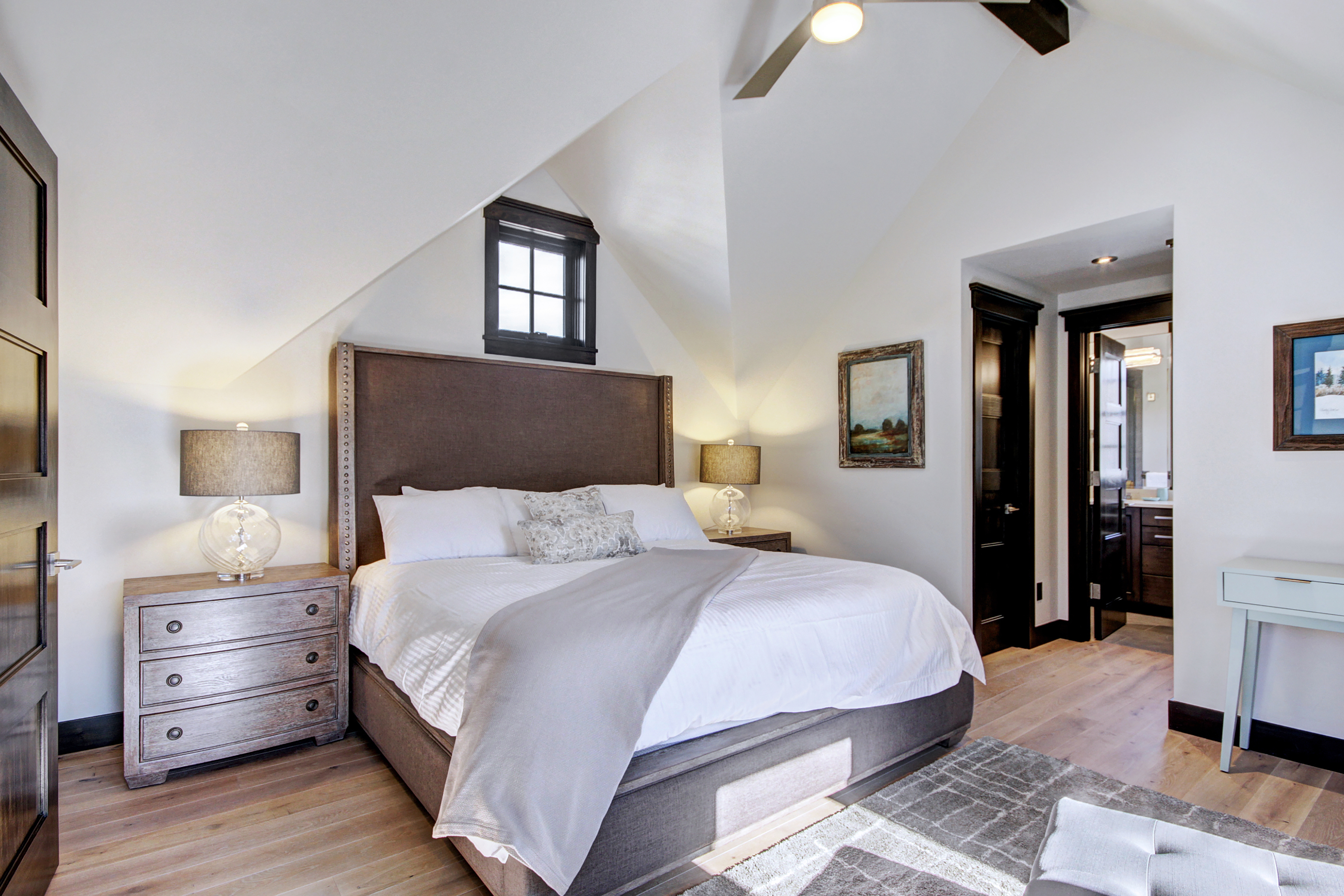 The second upper level master bedroom boasts a king bed, TV and private bathroom -  The Bogart House Breckenridge Vacation Rental