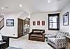 View towards the wet bar in the lower level living room. -  The Bogart House Breckenridge Vacation Rental 