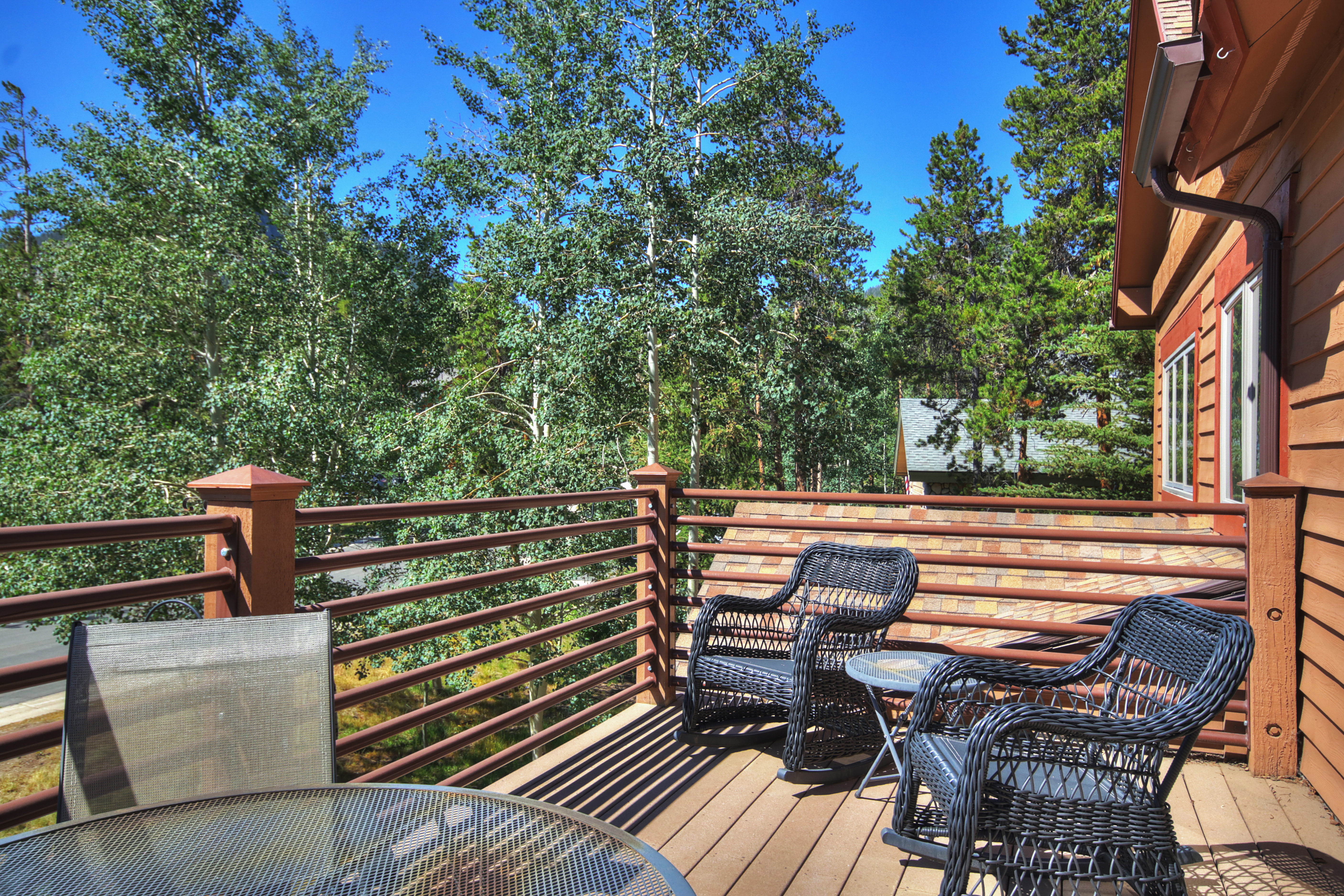 Enjoy the fresh mountain air from the upper deck off of the queen bedroom. - Buffalo Mountain Vista Frisco Vacation Rental