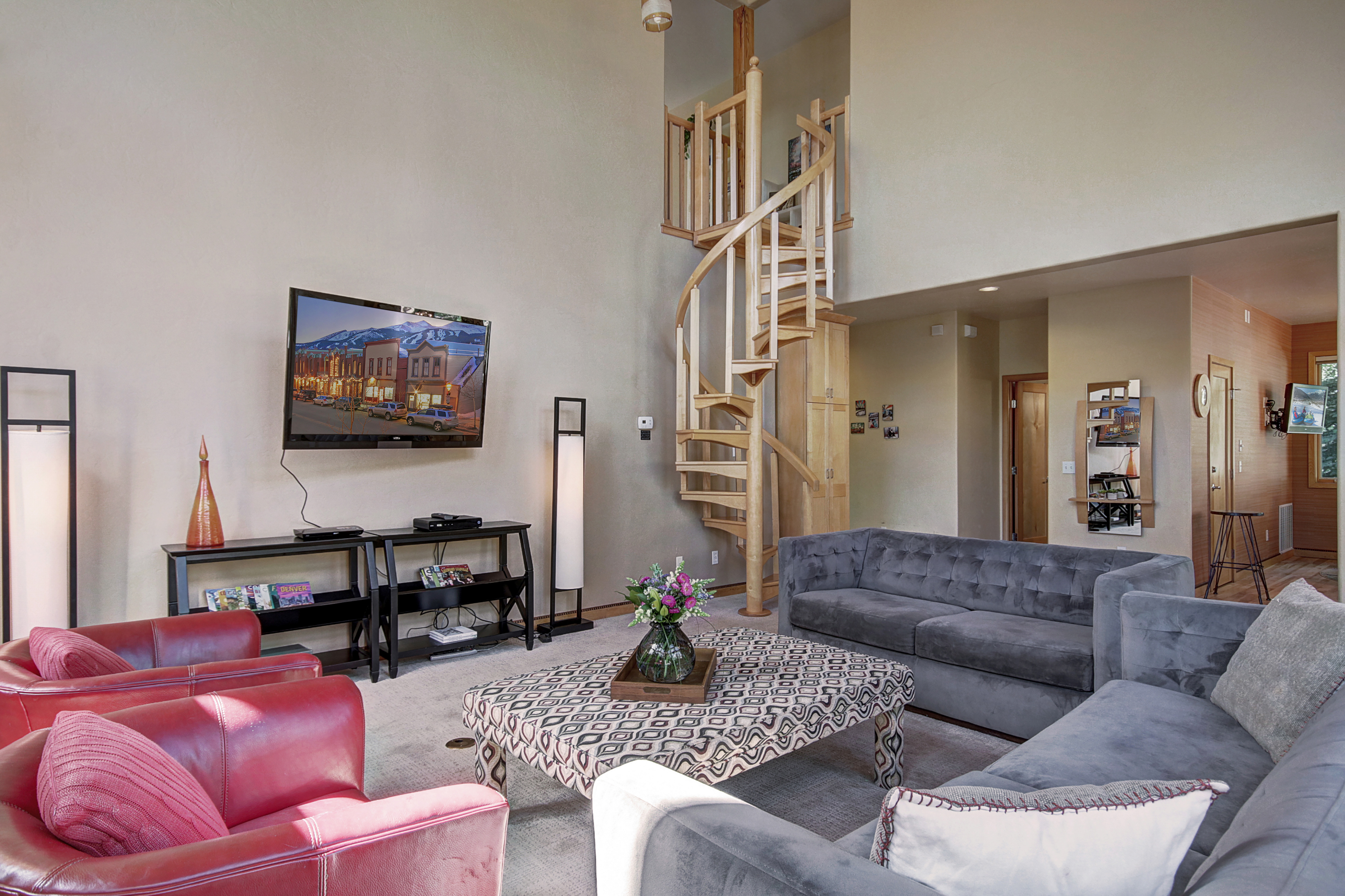 View toward the spiral staircase to access the upper level. - Buffalo Mountain Vista Frisco Vacation Rental