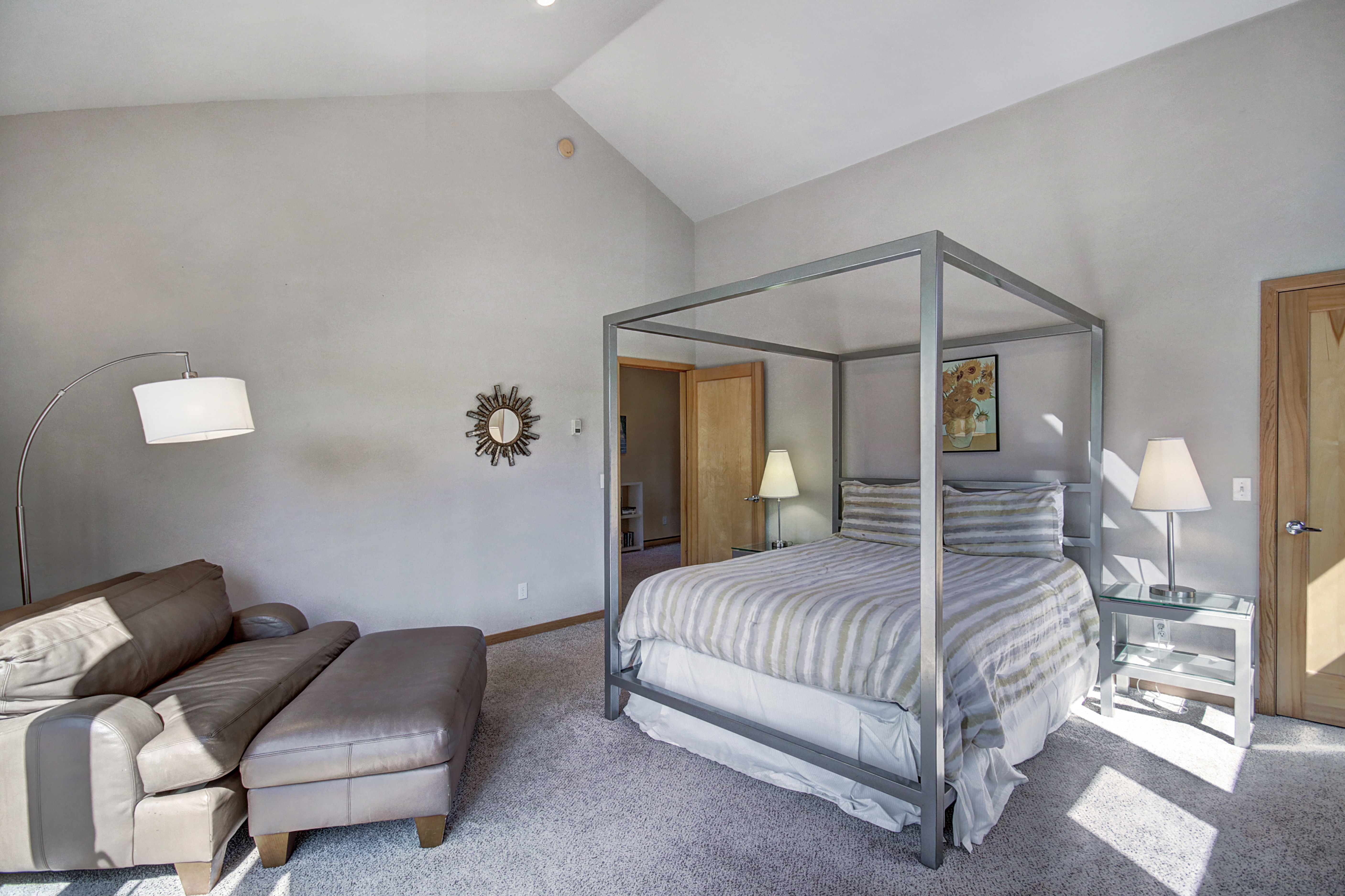 Upper level queen bedroom with private deck and flat screen TV. - Buffalo Mountain Vista Frisco Vacation Rental