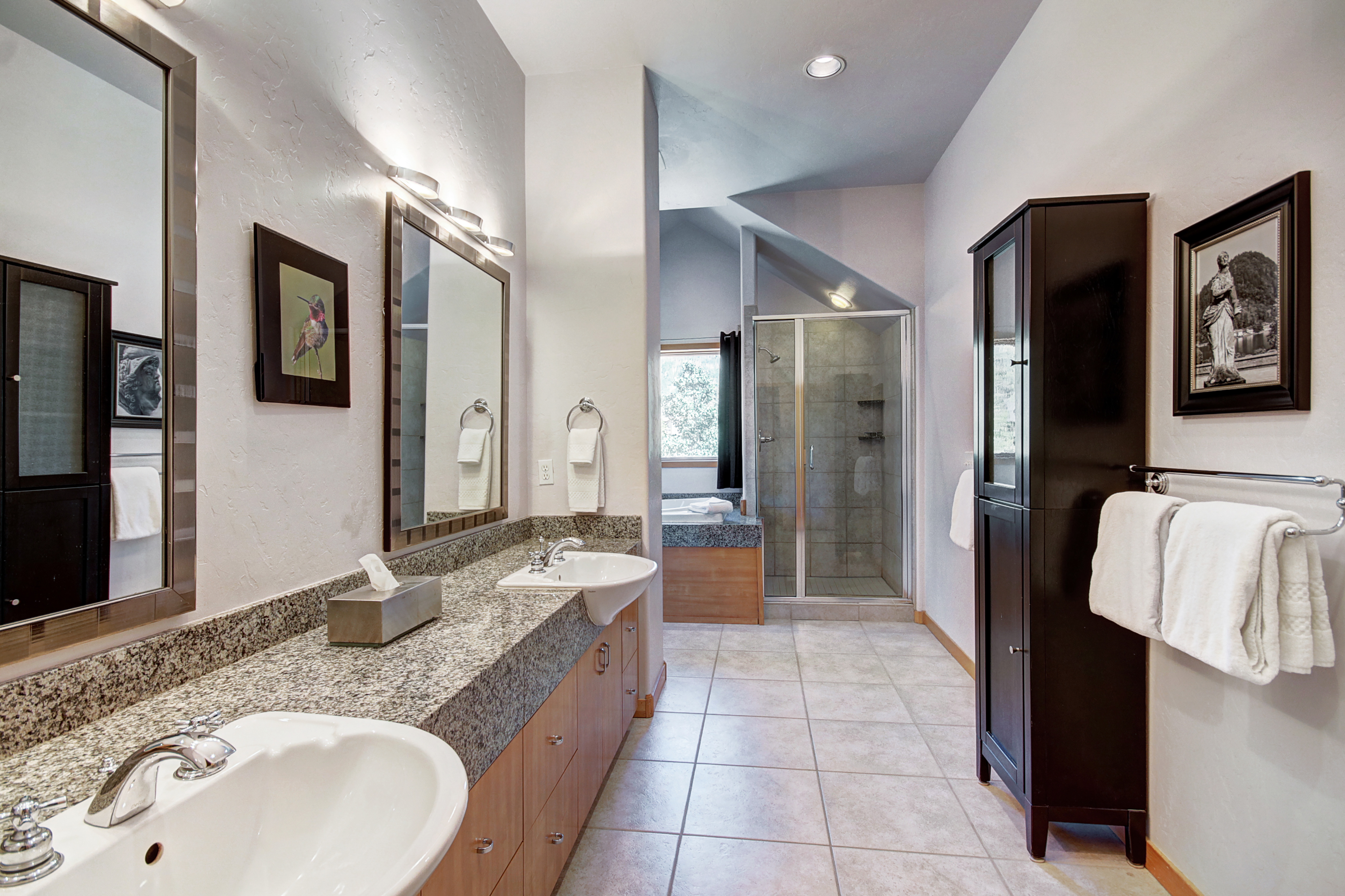 Upper level master bathroom with dual vanity, walk-in shower and jetted tub. - Buffalo Mountain Vista Frisco Vacation Rental