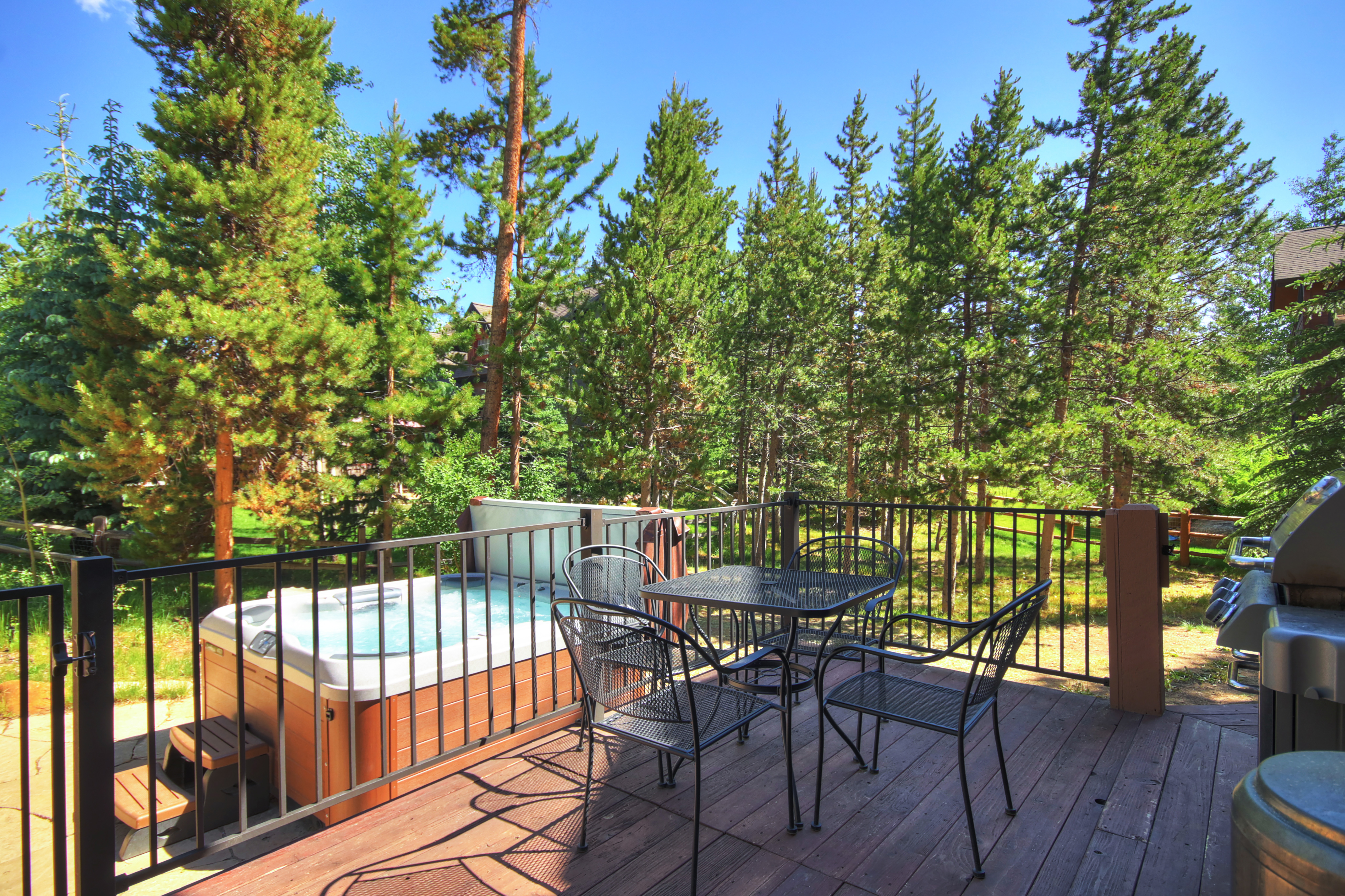Enjoy meals on the back deck during the warmer months. - Buffalo Mountain Vista Frisco Vacation Rental