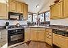 The kitchen boasts plenty of counter space. - Charter Ridge 10 Breckenridge Vacation Rental 