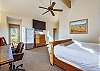 Cozy bed with large flat screen TV for ultimate relaxation on vacation. - Charter Ridge 10 Breckenridge Vacation Rental 