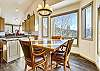 Panoramic views of the mountains around this breakfast nook. - Charter Ridge 10 Breckenridge Vacation Rental 