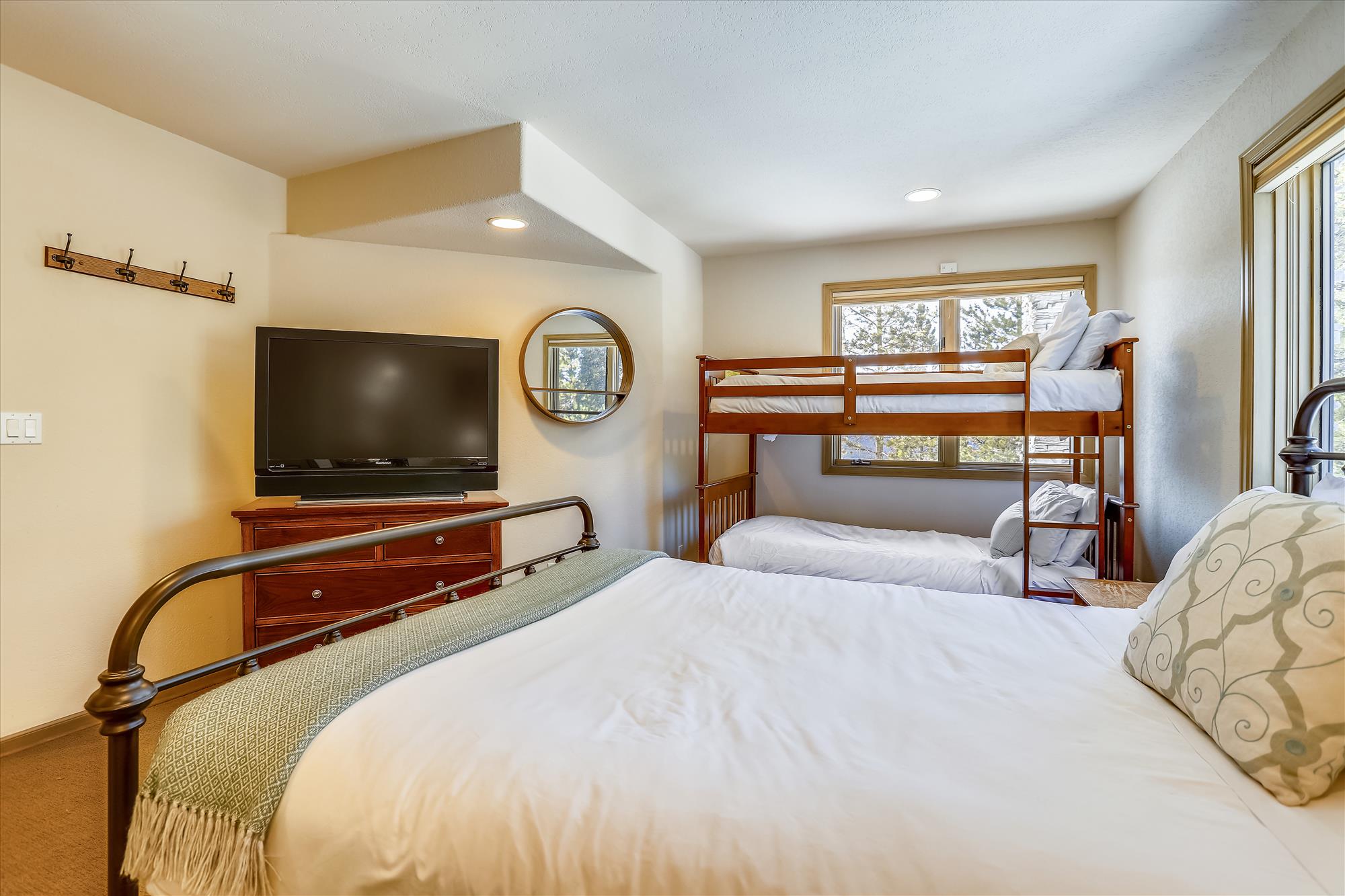 Unwind in this bunk room with lots of space and a flat screen TV.