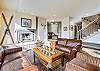 The inviting living room is a perfect gathering place for your group. - Charter Ridge 10 Breckenridge Vacation Rental 