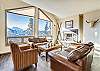 Cozy leather seating and beautiful natural light in the living room. - Charter Ridge 10 Breckenridge Vacation Rental 