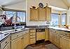 The large kitchen is perfect for cooking meals for your group. - Charter Ridge 10 Breckenridge Vacation Rental 