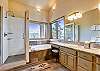 Take a relaxing bubble bath in the master bathroom with beautiful views overlooking the mountains. - Charter Ridge 10 Breckenridge Vacation Rental 