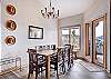 Dining table with seating capacity for 8, plus the 4 stools at the bar. - Charter Ridge 60 Breckenridge Vacation Rental 