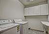 Laundry room with full size washer and dryer - Charter Ridge 60 Breckenridge Vacation Rental 