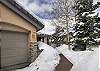 Two car garage and additional parking spaces in the driveway. - Charter Ridge 60 Breckenridge Vacation Rental 