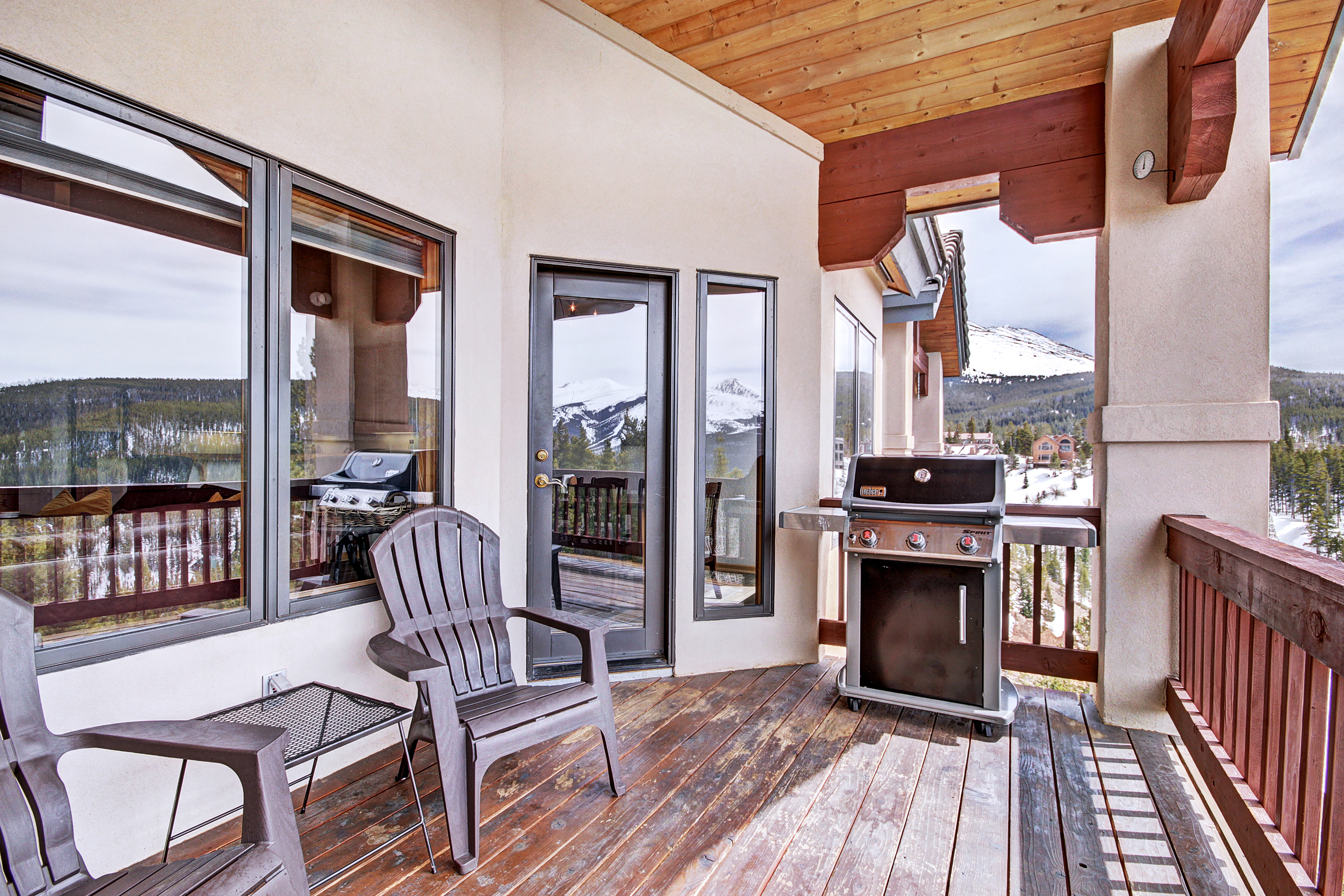 Main level patio with gas grill and seating to take in panoramic mountain views