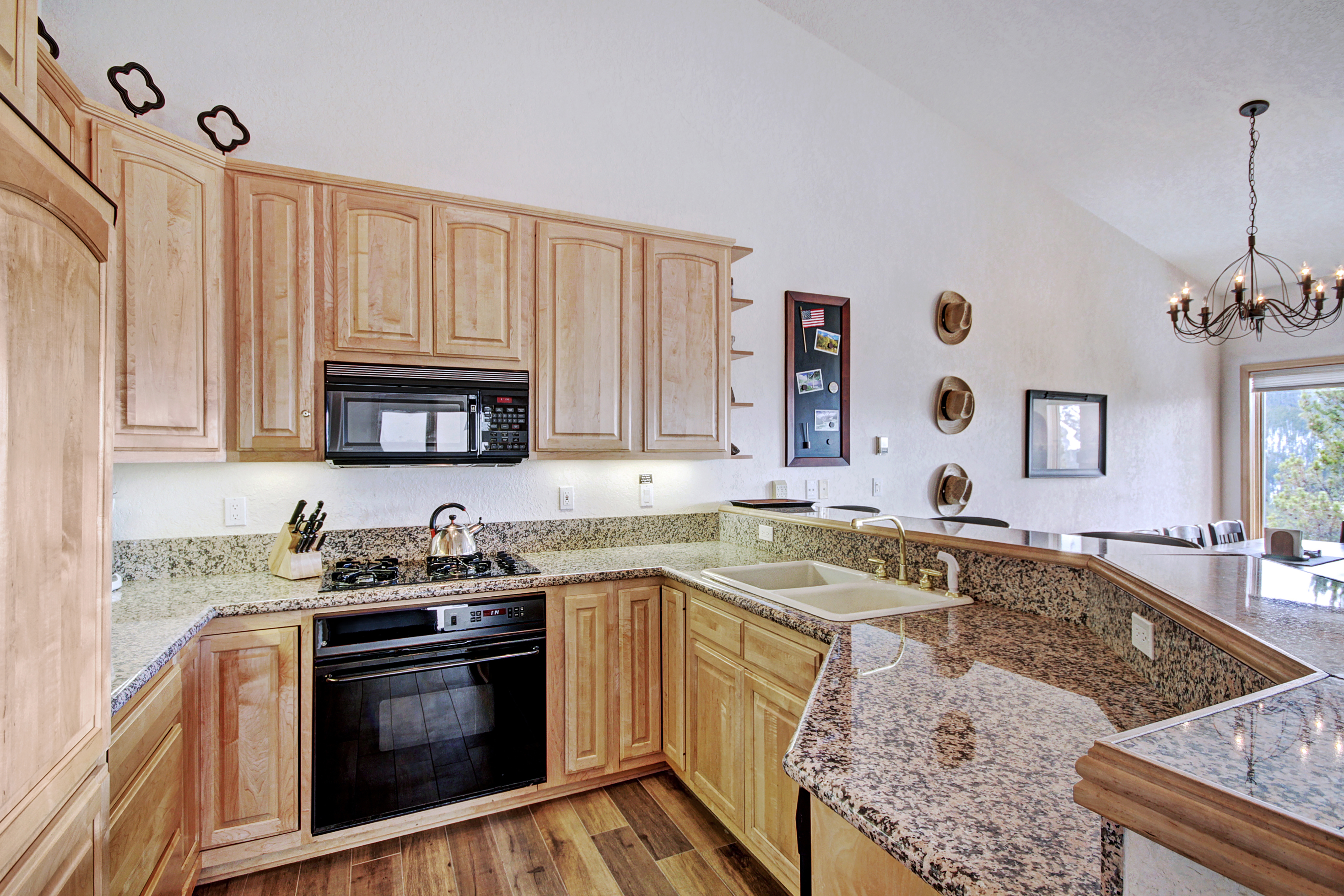 Contemporary kitchen with upgraded appliances and granite counter tops.
