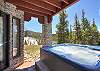 Relax on the lower level back patio with private hot tub. - Charter Ridge 60 Breckenridge Vacation Rental 