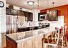 Seating for 3 at the kitchen bar. - Cimarron 301 Breckenridge Vacation Rental 