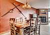 Enjoy meals or a good card game at the large dining room table. - Cimarron 301 Breckenridge Vacation Rental 