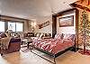 Queen Murphy bed in the living room. - Cimarron 301 Breckenridge Vacation Rental 