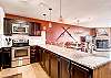 10 cup coffee maker, toaster and slow-cooker located in the kitchen. - Cimarron 301 Breckenridge Vacation Rental 