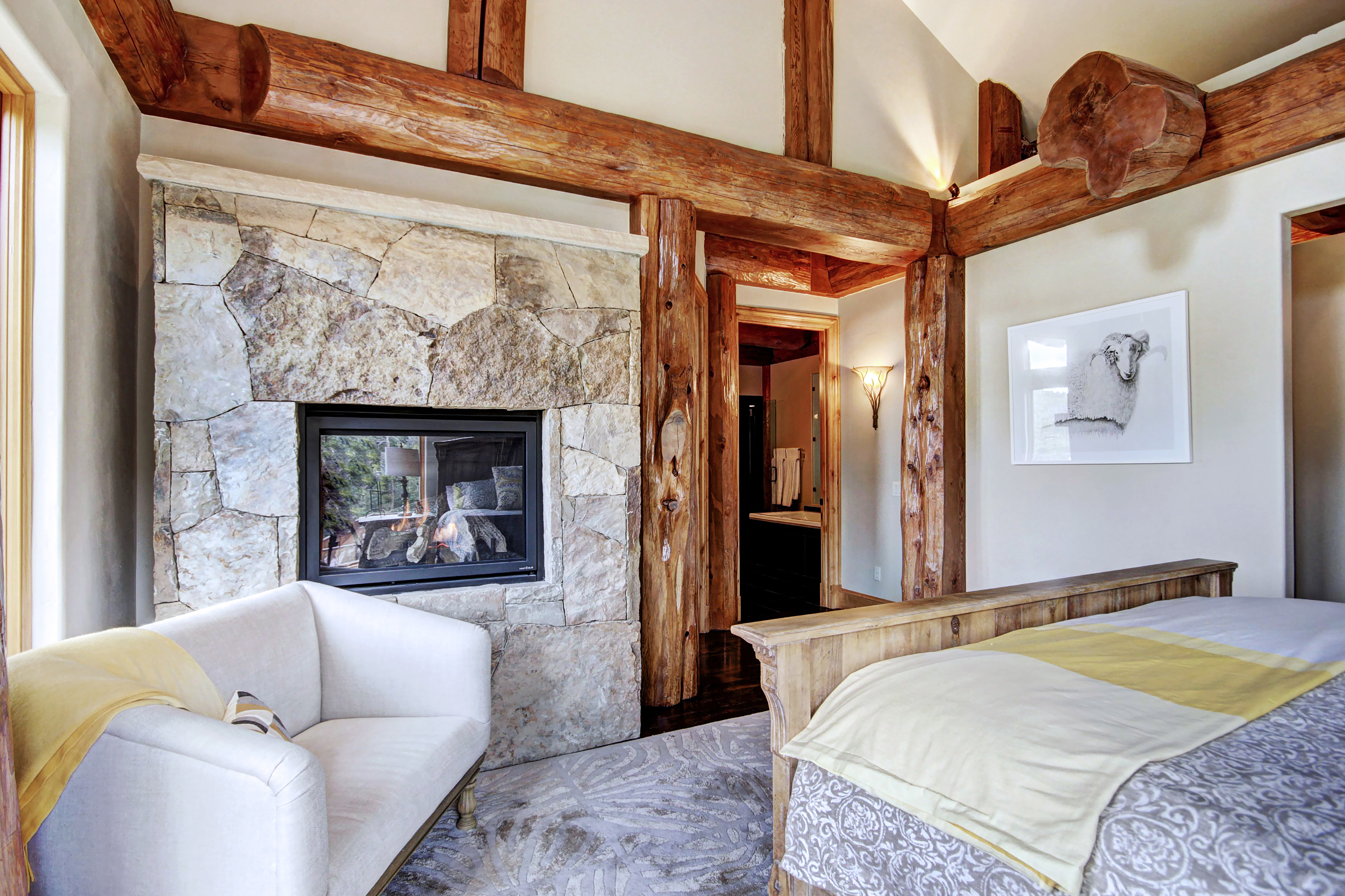 Main level master bedroom with en-suite bathroom and private fireplace - Clowsgill Holme Breckenridge Vacation Rental