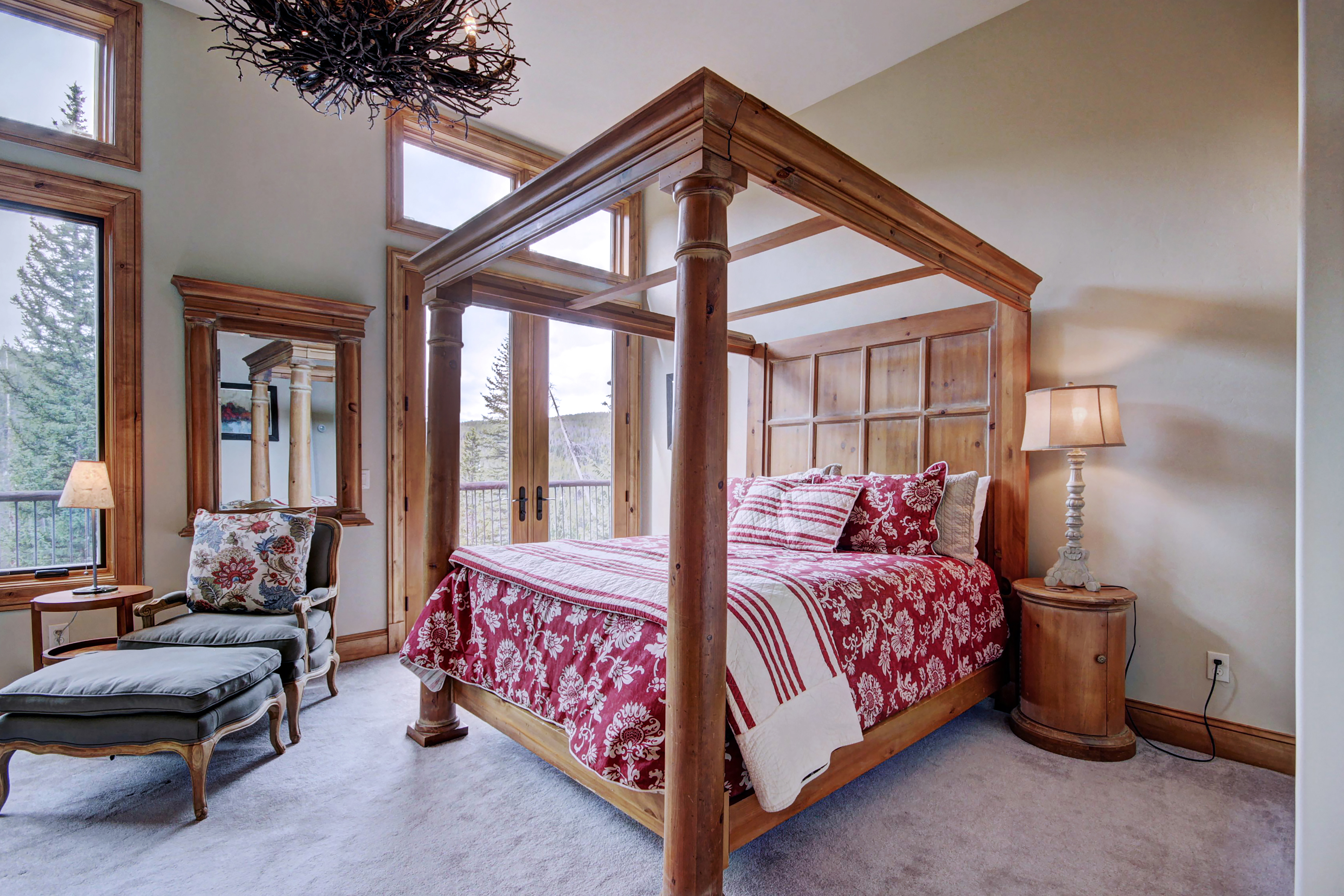 Lower level queen bedroom with seating area and private access to lower patio - Clowsgill Holme Breckenridge Vacation Rental