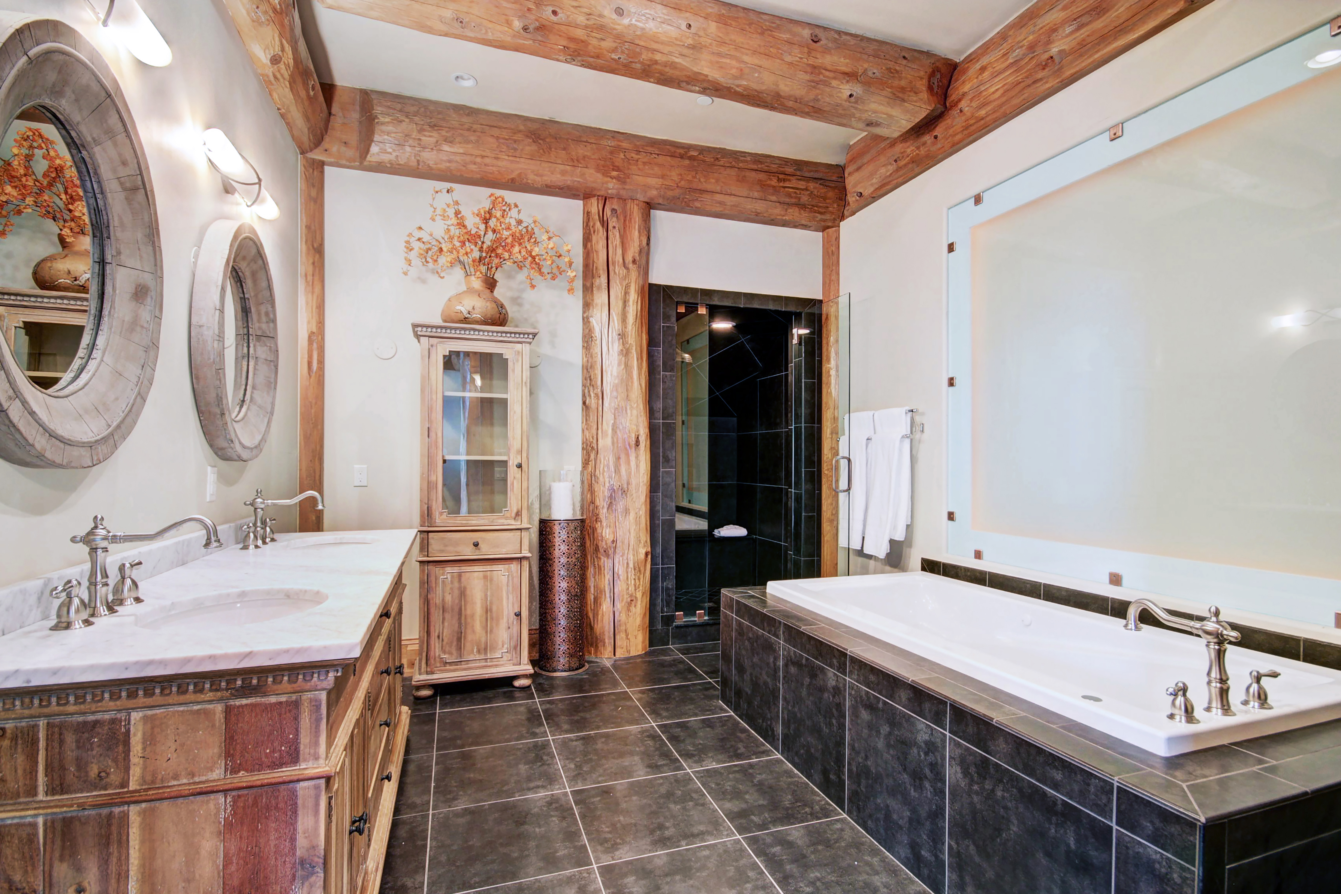 Master bathroom with soaking tub, walk in shower, and dual vanity sinks - Clowsgill Holme Breckenridge Vacation Rental