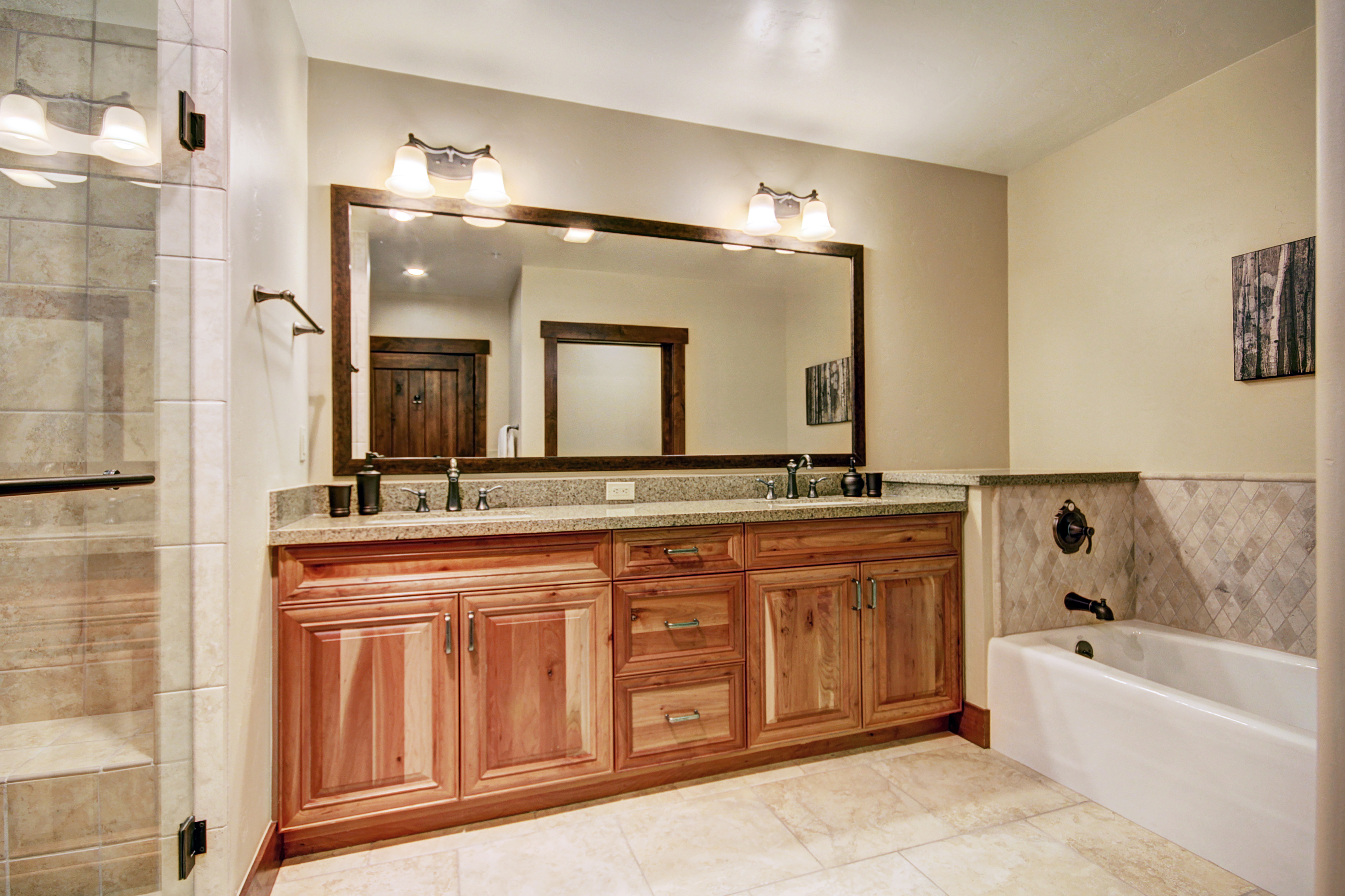 Master private bath with a walk-in shower, bathtub, and 2 sinks.