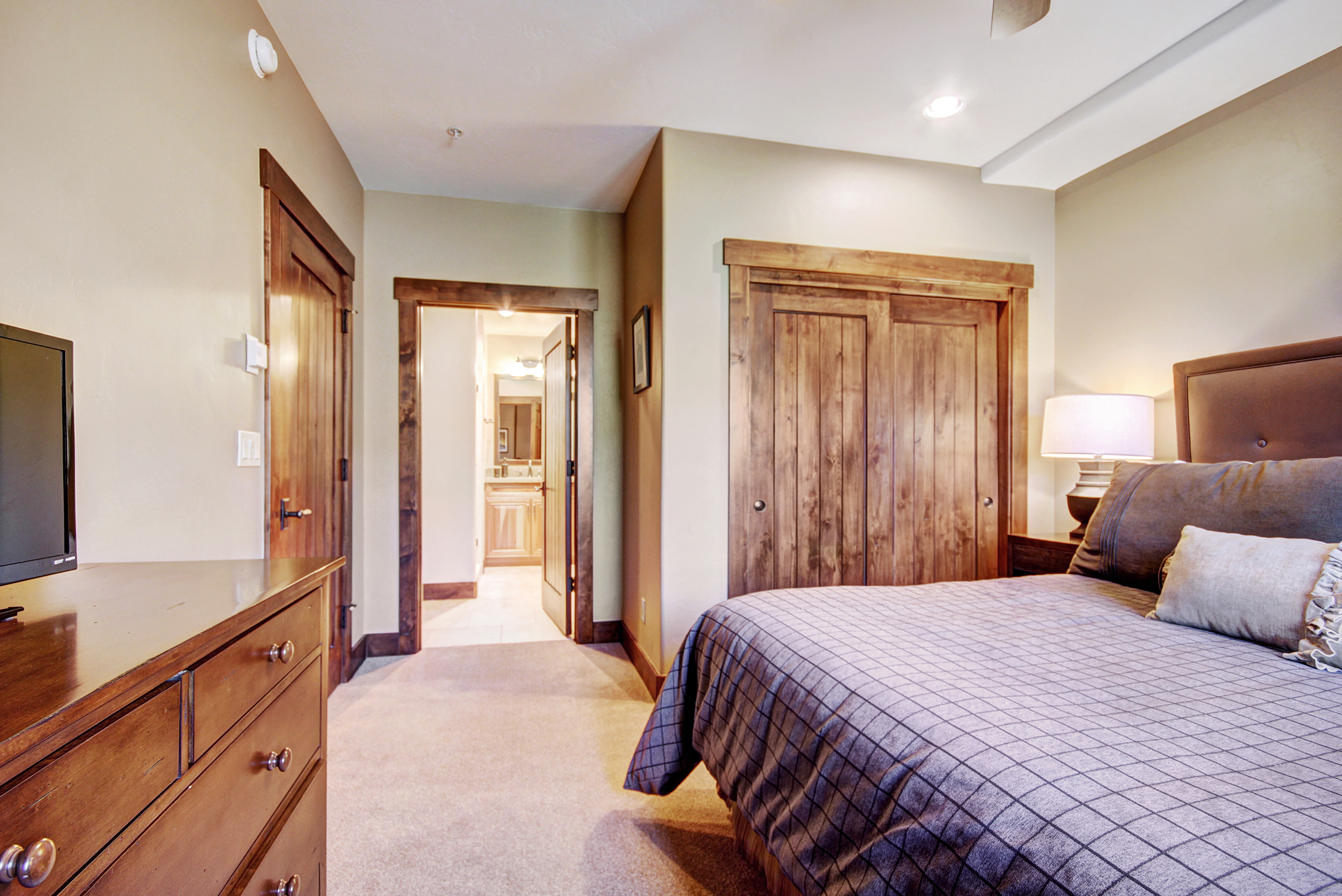 Relax in this spacious and cozy master bedroom after a long day/night out on the town.