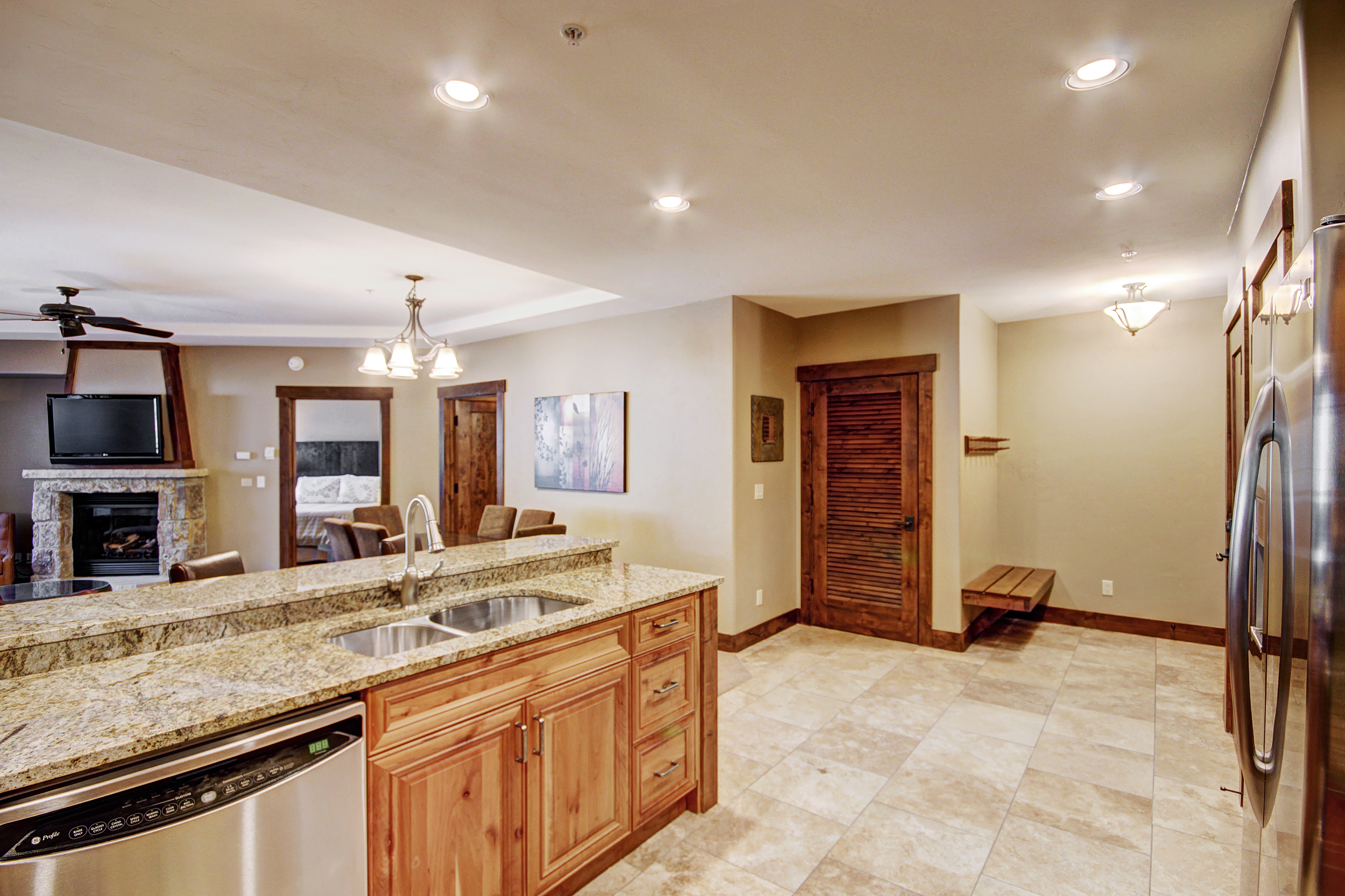Cooks will delight in the stainless appliances and polished granite countertops.