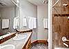 Private queen bathroom with shower/tub combo - Dunkin Hill Lodge Breckenridge Vacation Rental 