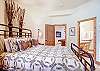 Queen bedroom with ensuite bathroom - Dunkin Hill Lodge Breckenridge Vacation Rental 