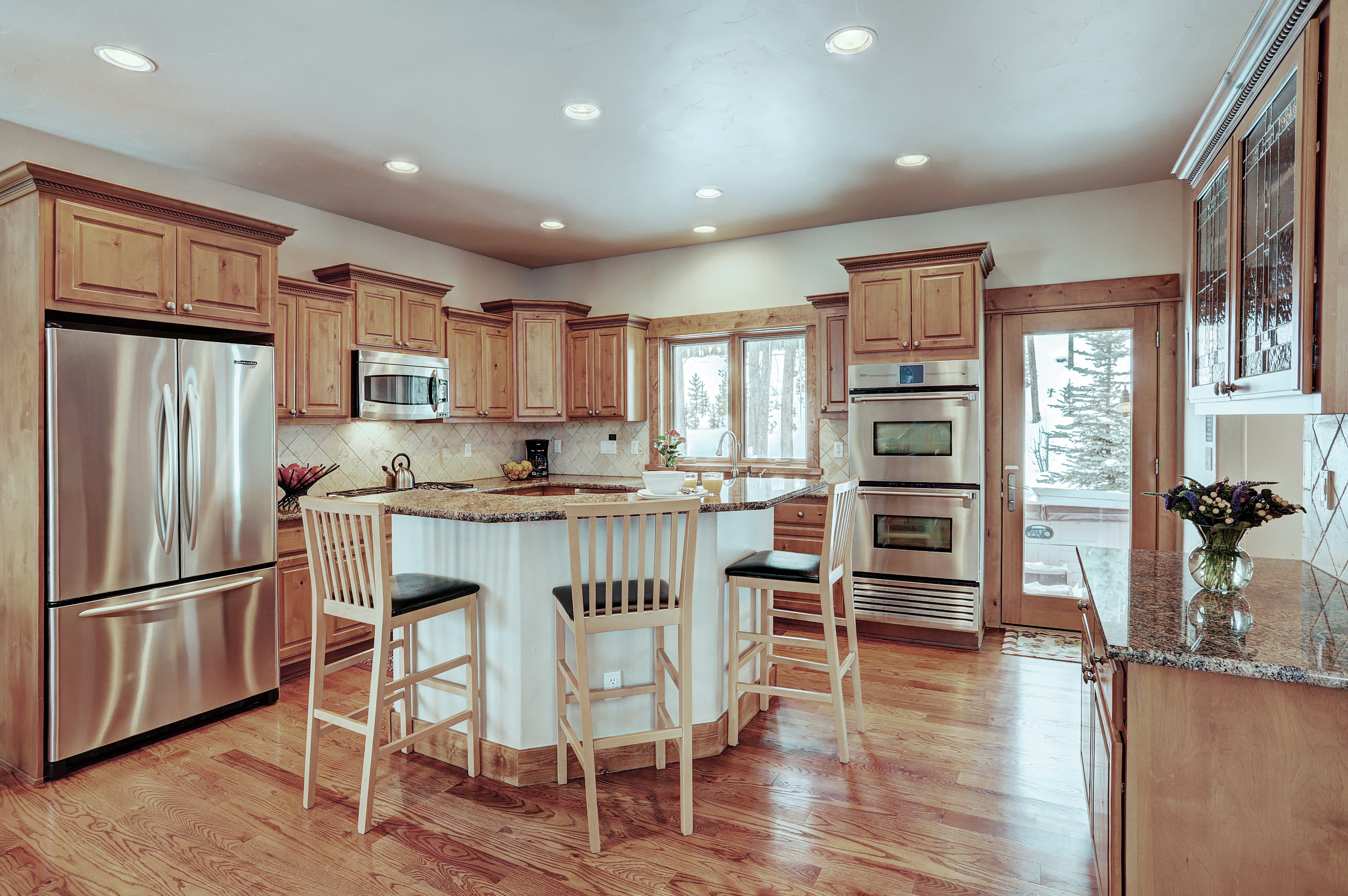 Large, spacious kitchen high end appliances and island seating - Highlands Trail House Breckenridge Vacation Rental