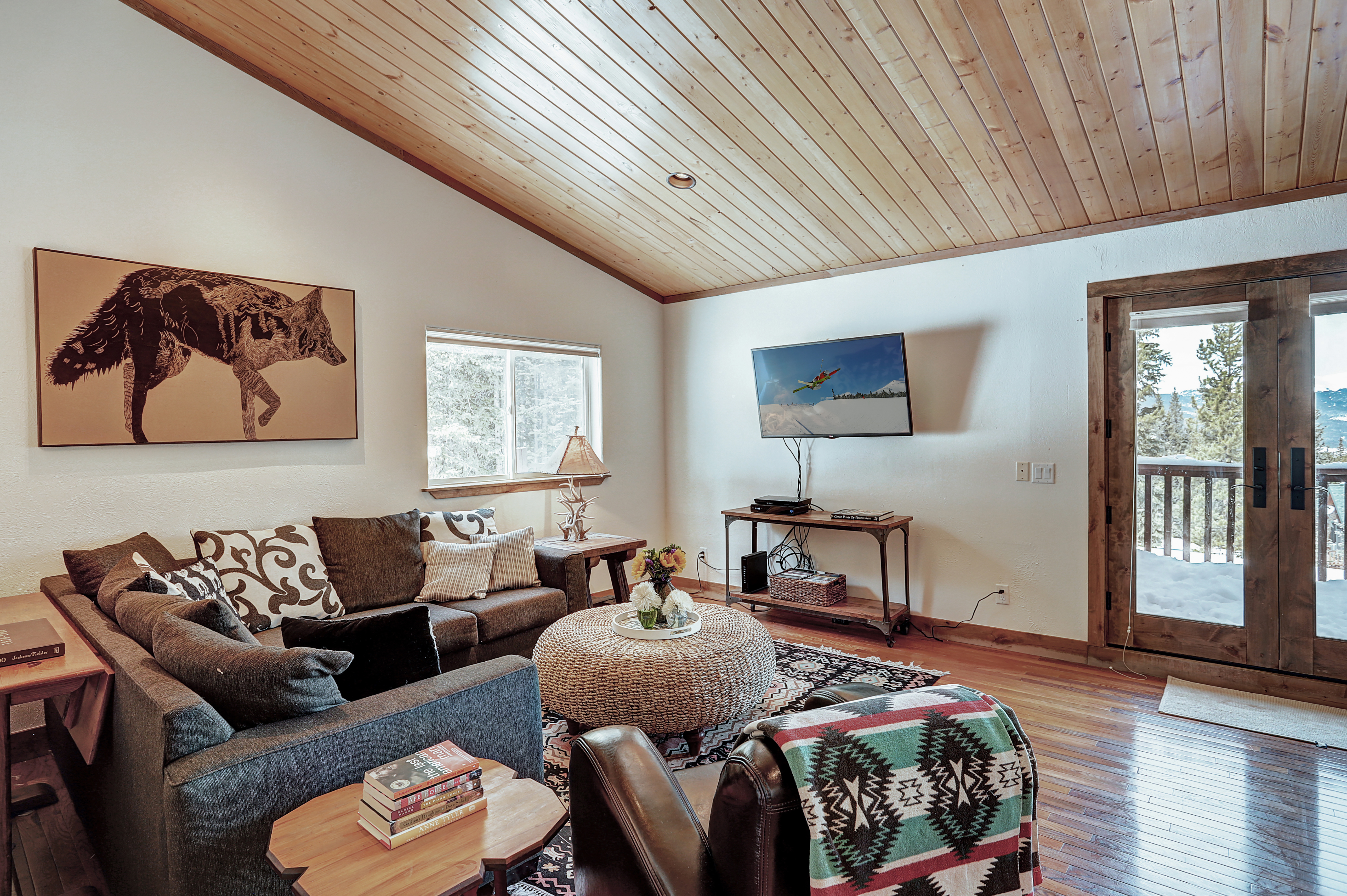 Tv room view leading into deck access - Lodge at Boreas Pass Breckenridge Vacation Rental